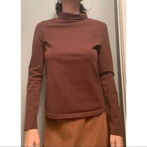 chocolate brown turtleneck. very tight head hole. no stretch